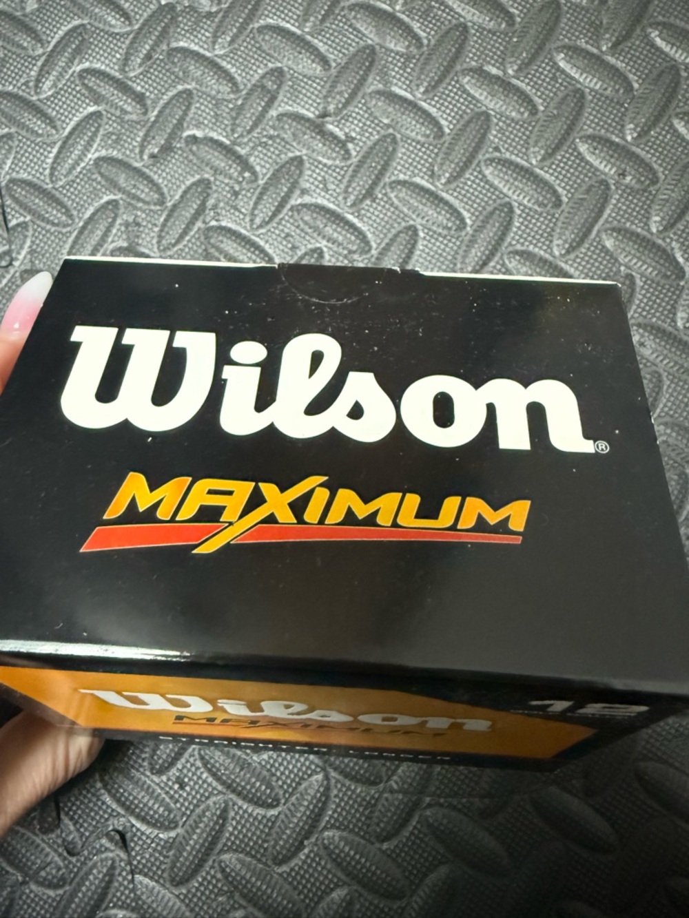 Wilson Golf Ball Box in Black with Orange and Red Accents